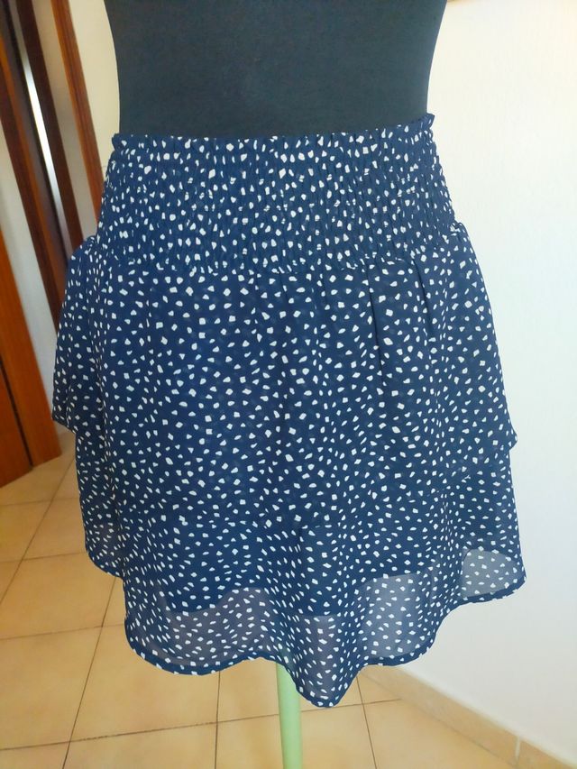 Gonna blu corta con fantasia