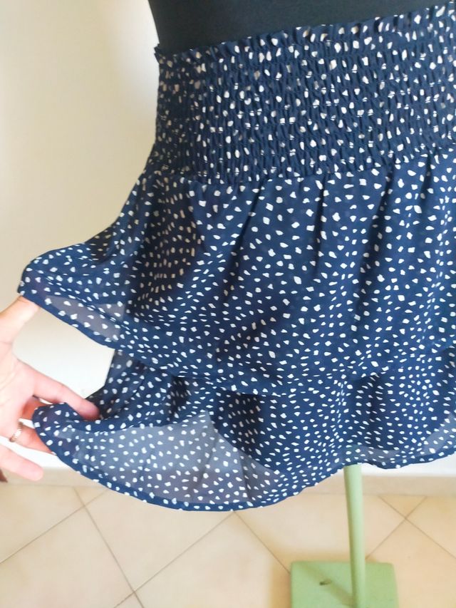 Gonna blu corta con fantasia