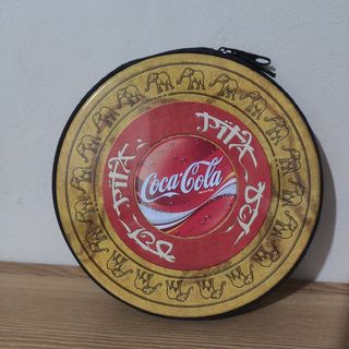 Set Coca Cola: portasigarette, tagliapizza + CD