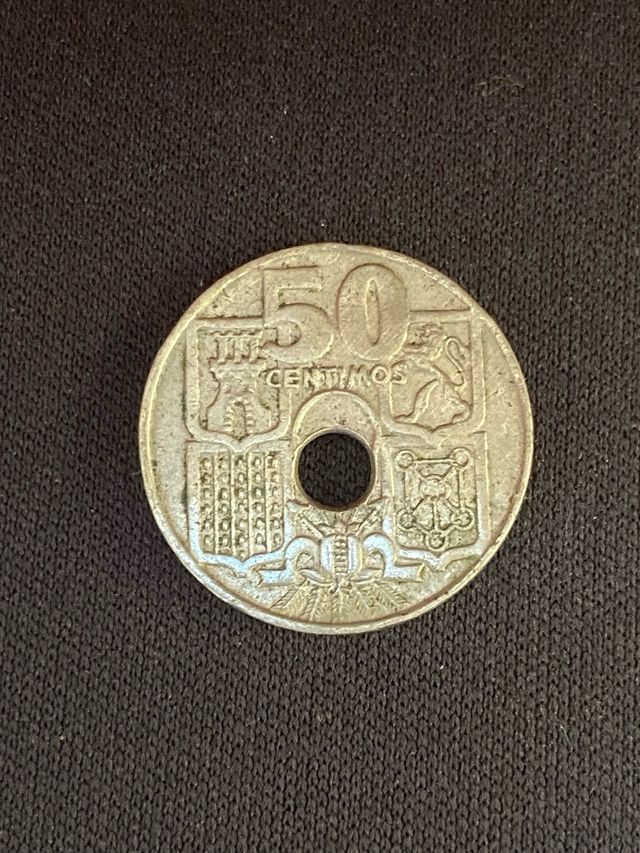moneda 50 céntimos 1963 Error Agujero desplazado