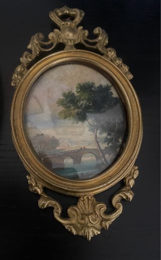 Quadretti ovali dorati con paesaggi