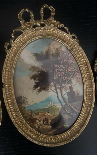 Quadretti ovali dorati con paesaggi