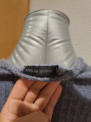 Jersey gris con bolsillos de lentejuelas