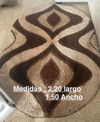 Alfombra ovalada beige y marrón