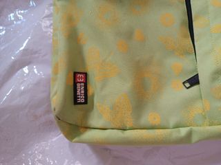 Bandolera verde y amarilla con estampado