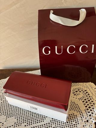 Occhiali da sole Gucci neri e oro