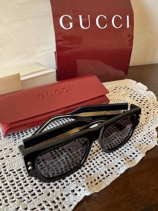 Occhiali da sole Gucci neri e oro