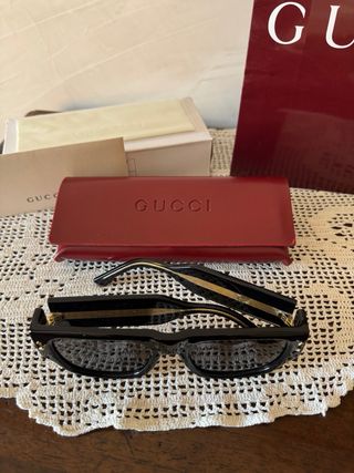 Occhiali da sole Gucci neri e oro