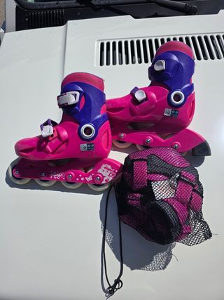 Patines en línea rosas con protecciones