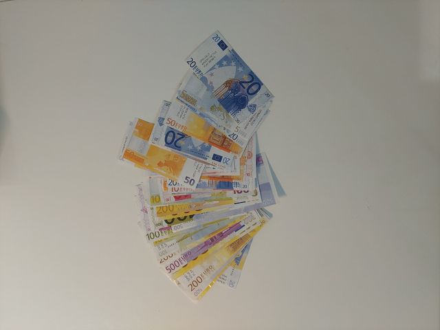 Caja Registradora Infantil con billetes y monedas.