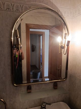 Espejo de pared dorado y cristal