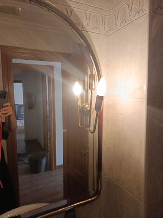 Espejo de pared dorado y cristal