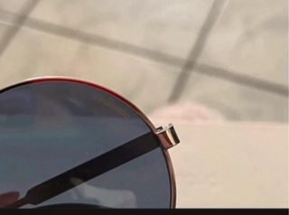 Occhiali da sole Polaroid rotondi argento