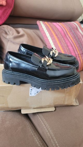 Mocasines Parfois negros suela track