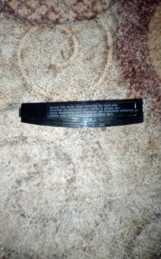 Tapa lateral disco duro PS3