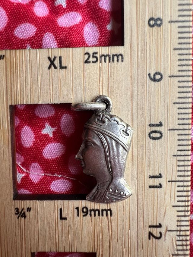 Colgante antiguo perfil cara plata