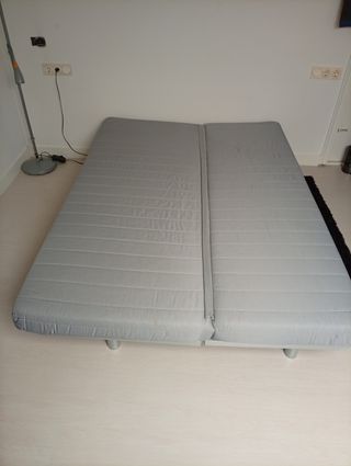 Sofá cama de Ikea con funda turquesa