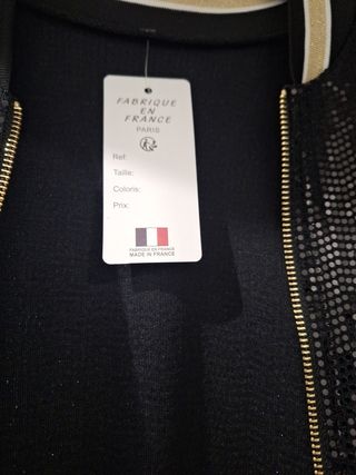 Cazadora bomber lentejuelas negra y dorada