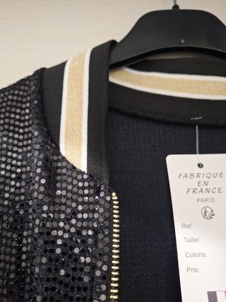 Cazadora bomber lentejuelas negra y dorada