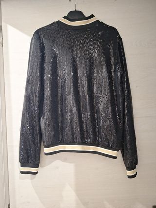 Cazadora bomber lentejuelas negra y dorada