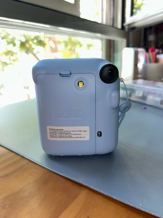 Cámara Instax Mini 12 Azul Fujifilm con 5-6 fotos