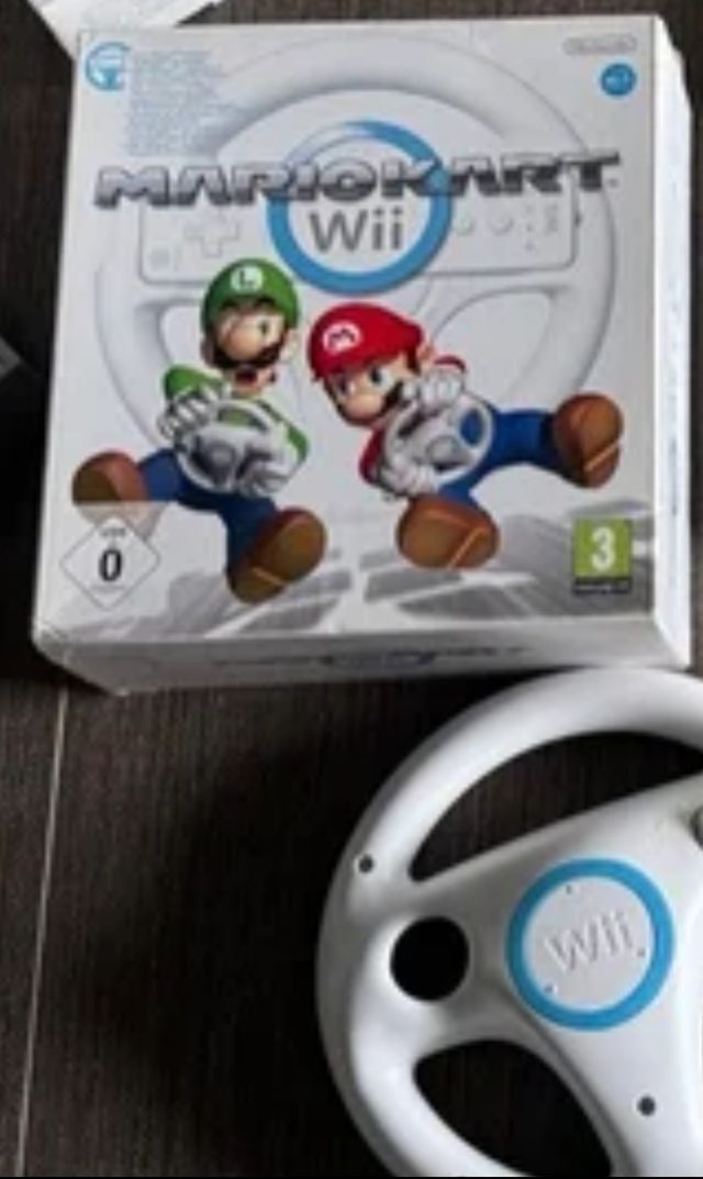 Mario Kart Wii con volante y caja