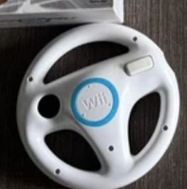 Mario Kart Wii con volante y caja