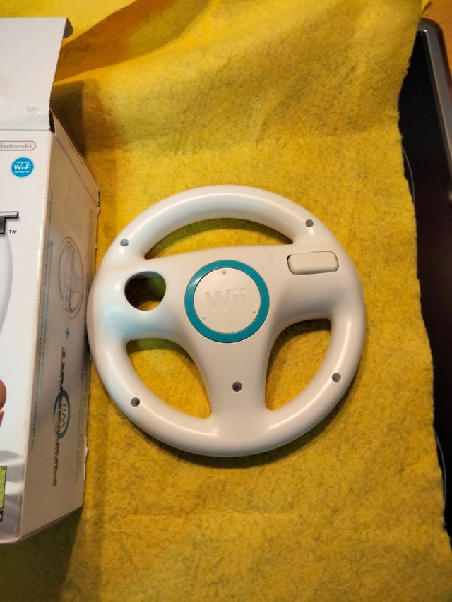 Mario Kart Wii con volante y caja