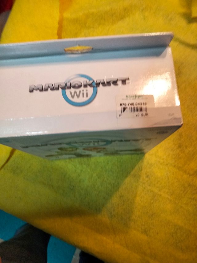 Mario Kart Wii con volante y caja