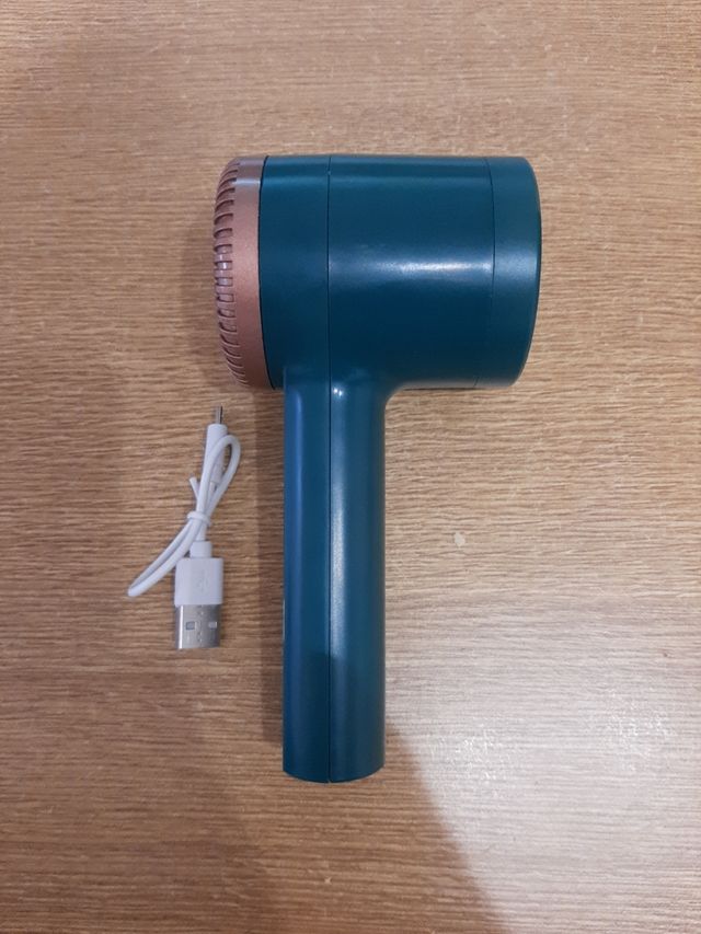 Quitapelusas eléctrico portátil