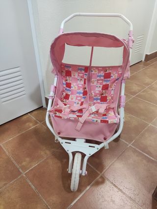 Cochecito gemelar de juguete rosa