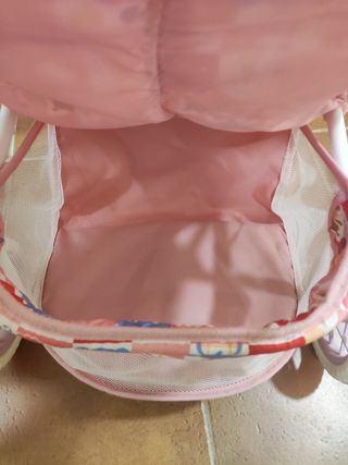 Cochecito gemelar de juguete rosa