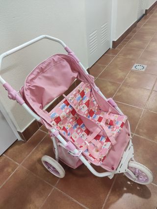 Cochecito gemelar de juguete rosa