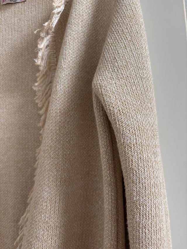 Soprabito in cotone beige con frange
