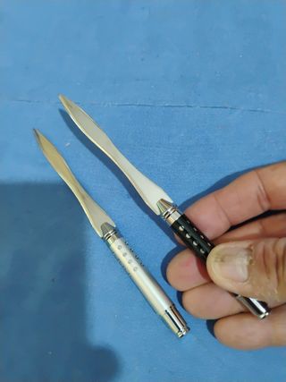 Taglia carte in titanio 5 euro tutte due