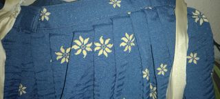 Falda huerta con pliegues y estampado floral