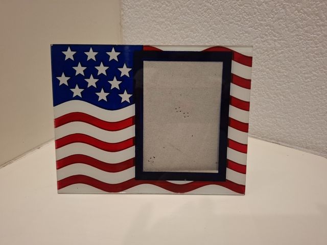 Marco de fotos con la bandera de EEUU.