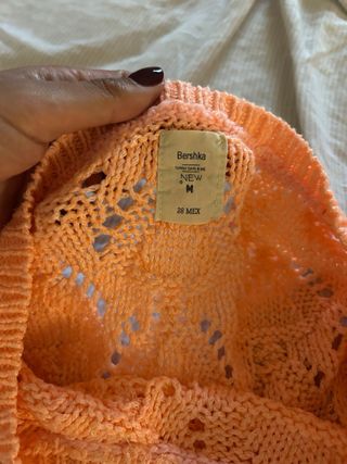 Maglioncino traforato pesca