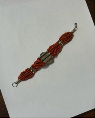 Bracciale 12 fili perline corallo