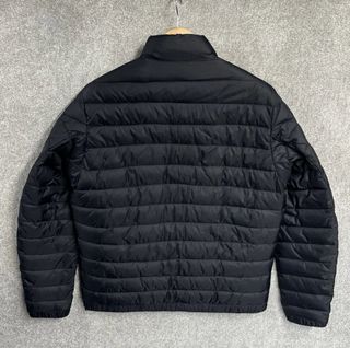 Chaqueta Barbour acolchada negra y amarilla