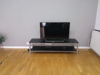 Mueble TV cristal negro y metal