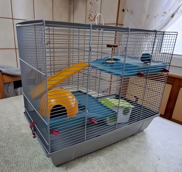 Jaula para mascotas azul y gris