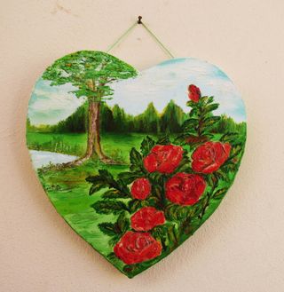 Quadro a cuore con rose rosse