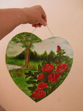 Quadro a cuore con rose rosse