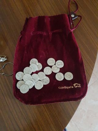 Monedas de plata o arras con bolsa