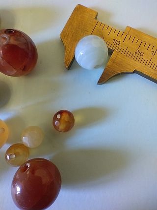 14 palline agata rossa/corniola varie misure