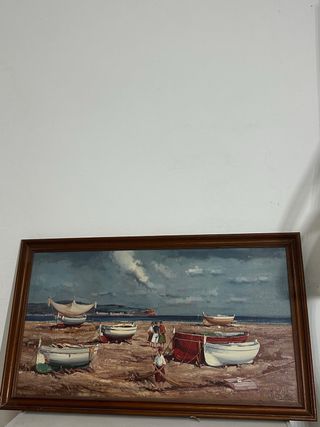 Cuadro de barcos en la playa