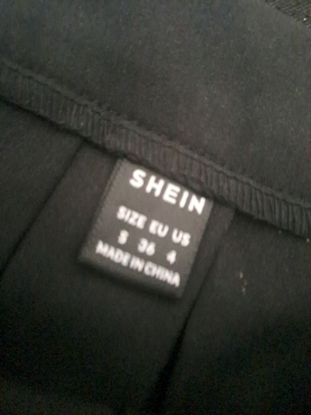 Falda de tablas negra para mujer