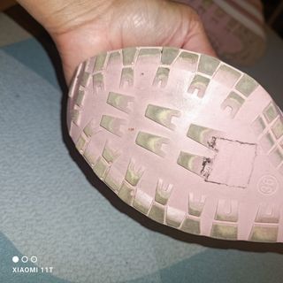 Zapatillas deportivas rosas con lazo