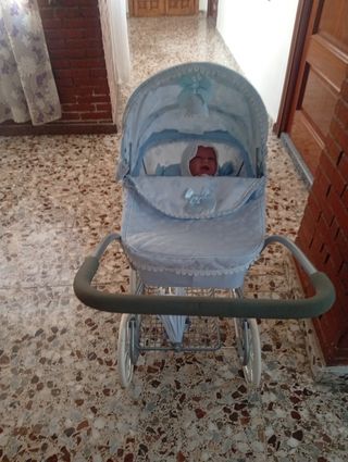 Carrito de bebé de juguete azul
